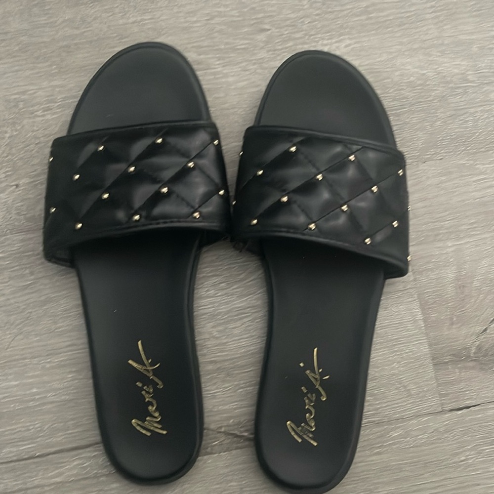 Black slides with gold
